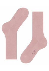 Chaussettes rose clair en matériau lisse, avec un haut côtelé et une texture subtile. Marquées "FALKE" et "TIAGO" sur la semelle.