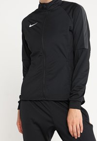 Nike Performance Træningsjakke - black