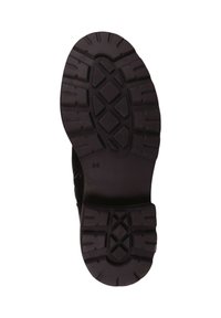 Suela de zapato de goma negra con un patrón de dibujo profundo, que presenta texturas hexagonales y lineales, marcada con la talla "36".