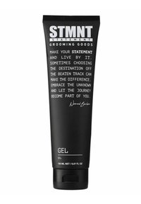 Schwarze Tube von STMNT Grooming Goods Gel mit motivierendem Text und 150 ml Inhalt, ausgestattet mit einem Klappverschluss.