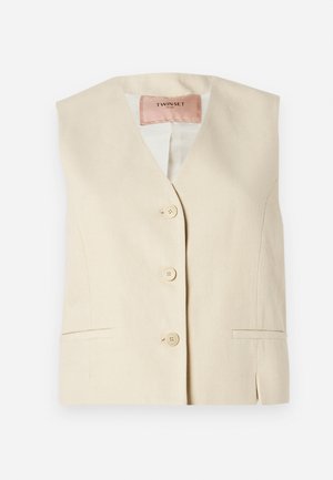 Beige vest with a V-neck design, featuring four front buttons, side pockets, and a smooth, textured fabric finish. Brand label: Twinset.
