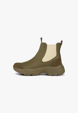 Bottines étanches de couleur vert olive avec des côtés en élastique marron, semelle en caoutchouc, languettes de tirage et finition texturée pour une adhérence et un confort optimal.