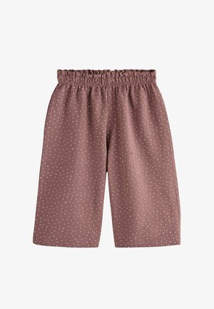 Braune, weit geschnittene, verkürzte Hosen mit weißen Punkten und einem elastischen, gerafften Bund.