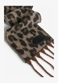 Sélectionné, dark leopard print