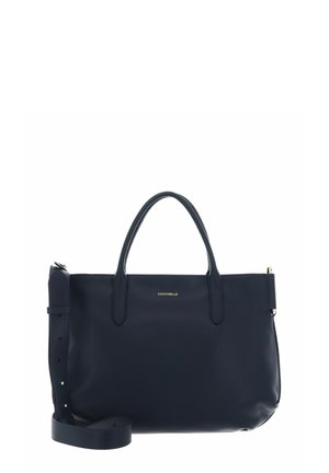 Sac à main en cuir bleu marine avec deux poignées, une bandoulière ajustable et un petit logo de marque doré au centre avant.