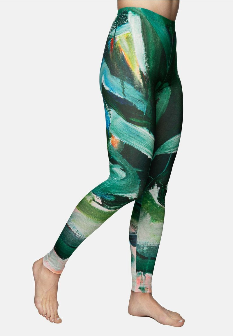 Tight-fitting leggings with a multicolored abstract pattern featuring green, blue, orange, and pink hues; made of stretchable fabric.
