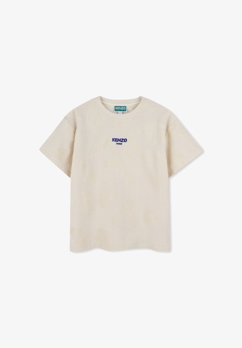 T-shirt beige en coton avec un motif de feuilles texturé, manches courtes et col rond. Présente le logo violet "KENZO Paris" sur le devant.