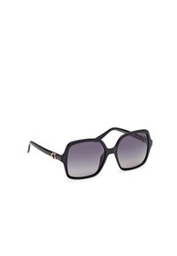 Black oversized sunglasses with gradient gray lenses, square shape, glossy finish, and gold hardware accents on the temples.