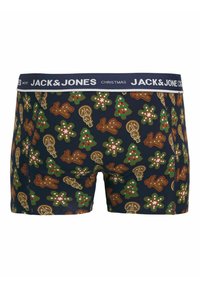 Boxershorts in een donkerblauwe stof met een patroon van peperkoekmannetjes, kerstbomen en lichtjes in bruin, groen en roze tinten.