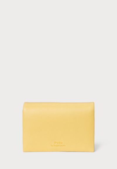 Yellow leather wallet with a smooth texture and a folded design. Features embossed branding in a subtle font.