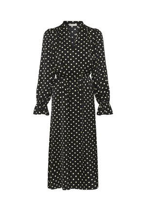 Melnas kleitas ar garām piedurknēm un baltām polka punktiem. Ir apkakle, priekšējā sprauga un vidukļa josta. Audums ir gludas tekstūras.