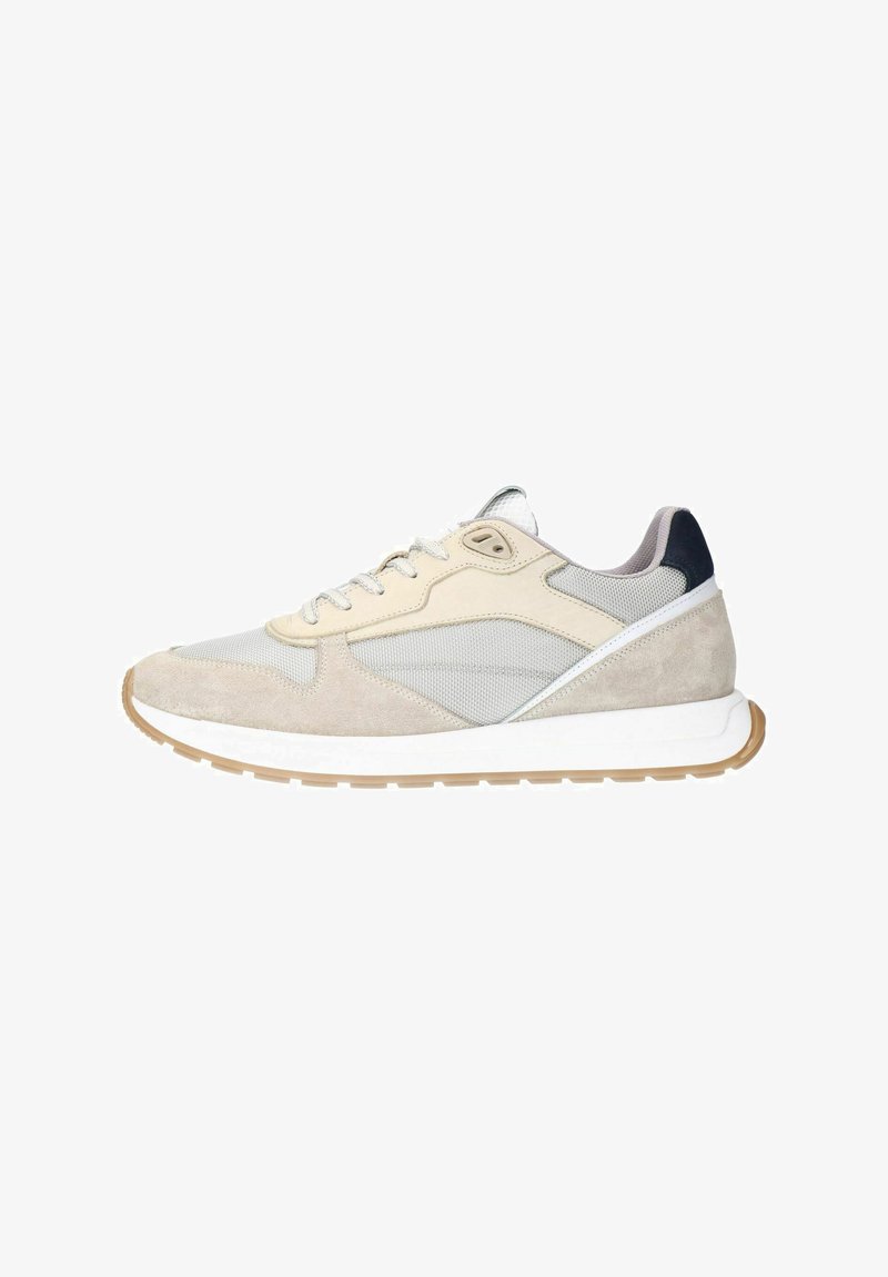 Light beige sneakers with a combination of suede and mesh. Features a gum sole, rounded toe, and contrasting navy accent on the heel.