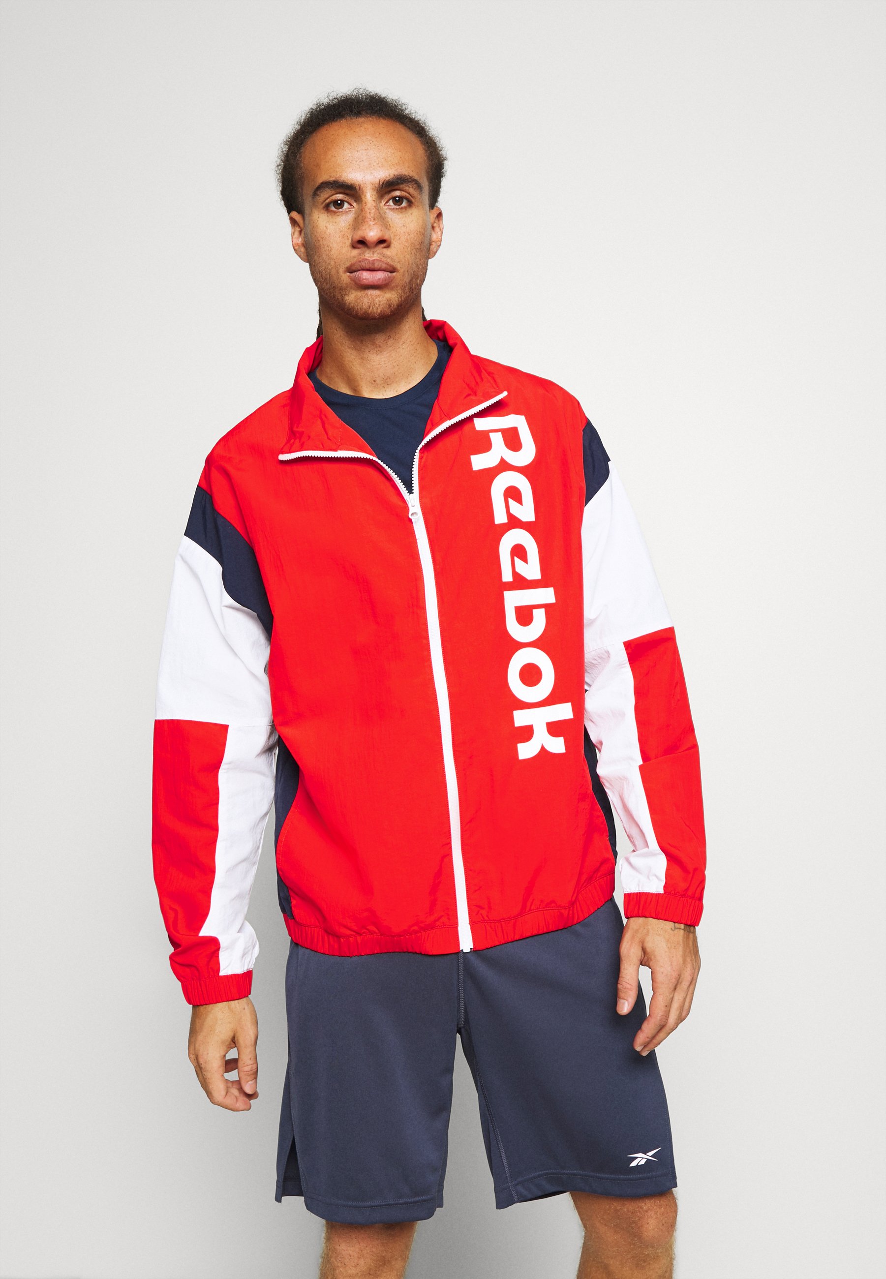 red reebok jacket