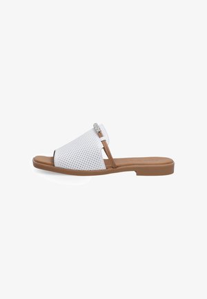 White perforated slide sandal with a brown strap and metallic accent. Flat sole, open toe design, and smooth texture.
