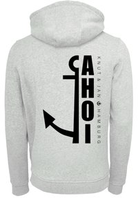 Gray hoodie featuring a large black anchor graphic and "AHOI" text on the back, alongside brand name "Knut & Jan Hamburg."