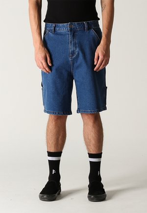 Former DISTEND - Farmer rövidnadrágok - dark blue denim