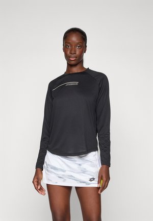 Black long-sleeve athletic shirt with a round neckline and silver logo, paired with a white skirt featuring a light blue abstract pattern.