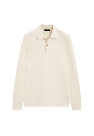 Pikétröja med lång ärm i ljust krämfärg, med klassisk krage, treknappars slits och subtil textur, tillverkad av mjukt tyg.