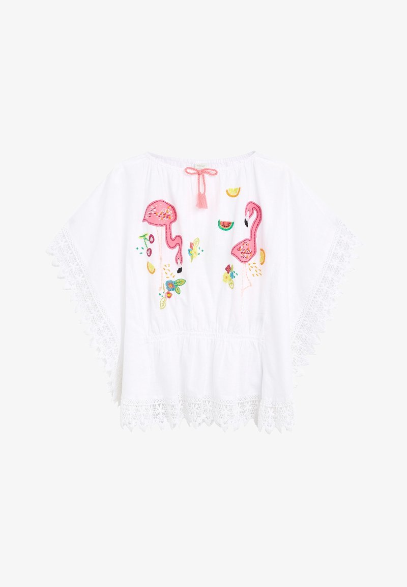 Weiße Baumwollbluse mit pinkem Flamingo-Stickerei, floralen Akzenten und einer Spitzenkante. Mit Rundhalsausschnitt und Quasten-Detail.