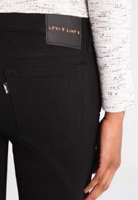 Levi's® Jeans Skinny Fit - black denim