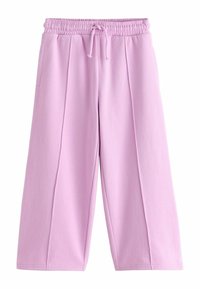 Helle rosa weit geschnittene Hose aus weichem Stoff, mit einem elastischen Bund und Kordelzug, zwei Seitentaschen und vorderen Faltendetails.