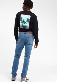 Lee RIDER - Slim fit jeans - dark blue
