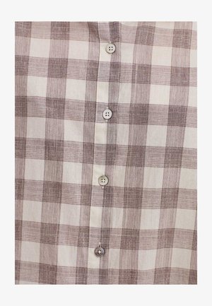 Košulja dugih rukava u bež i smeškastom karirastom uzorku, sa laganom teksturom tkanine, pet dugmadi na prednjem delu i klasičnom kragnom.