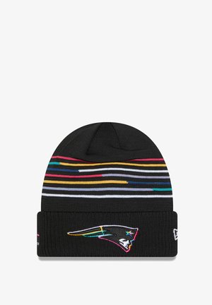 Black knit beanie featuring multicolored horizontal stripes and a logo patch of a flying bird on the front. Soft texture, tight fit.