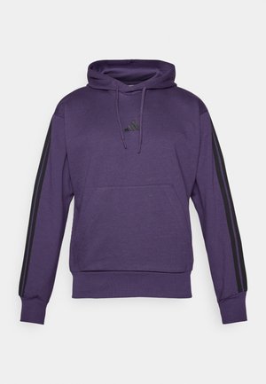 Ljubičasti dukserica s prednjim kangaroo džepom, kapuljačom s vezicom i crnim trakama duž rukava. Adidas logo na prsima.
