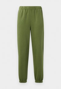 Pantalones de chándal elásticos verdes con una textura suave, pierna ajustada y puños fruncidos en los tobillos. Diseño simple y funcional.