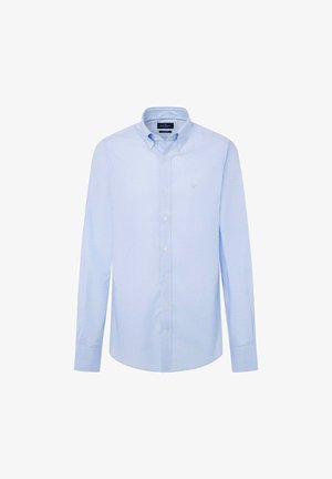 Vaaleansininen ruudullinen nappipaita, jossa on klassinen kaulus, pitkät hihat ja pyöristetty helma. Valmistettu sileästä, kevyestä kankaasta.