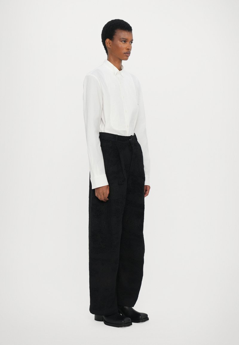 Henrik Vibskov ONE PANTS - Trousers - fishes black