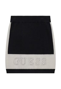 Stickad minikjol i svart och kräm med en ribbad midja. Har "GUESS"-logotypen i kontrasttråd på den krämfärgade panelen. Slät textur.