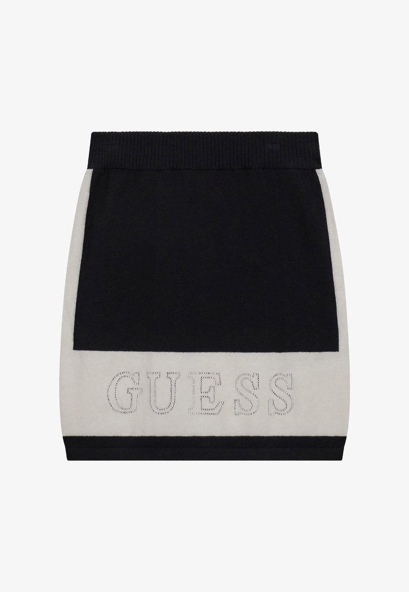 Gestrickter Minirock in Schwarz und Creme mit einem gerippten Bund. Merkmale das "GUESS"-Logo in kontrastierendem Garn auf dem Creme-Panel. Glatte Textur.