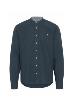 Camicia a maniche lunghe di un blu scuro, con colletto a band e bottoni frontali, dotata di taschino sul petto. Realizzata in un tessuto liscio con una sottile trama.