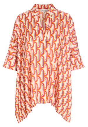 Tunic fluida in tessuto leggero con un motivo geometrico di forme interconnesse in tonalità di rosa, arancione e bianco. Maniche lunghe.