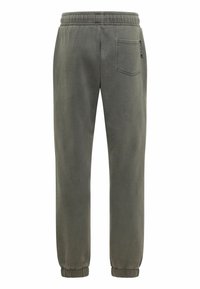 Groene katoenen joggers met een elastische tailleband, taps toelopende pijpen en een achterzak. Glad van textuur met een lichte glans.