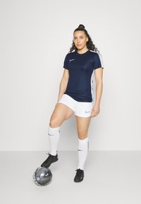 Nike Performance TOP BRANDED - Spordi T-särk - obsidian/white/white