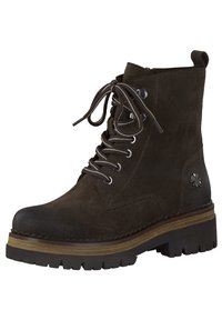 Bottine en suède marron avec fermeture à lacets, œillets en argent et semelle en caoutchouc noir texturé. Présente un détail floral décoratif sur le côté.