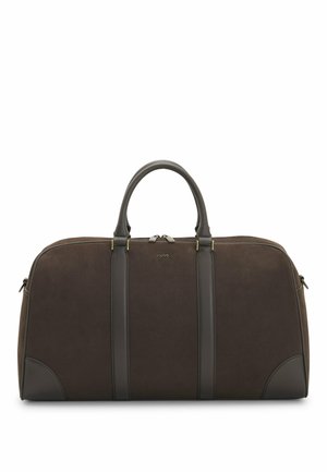 Borsa da viaggio in pelle marrone scuro con manici arrotondati, cinturini verticali in pelle e piccolo nome del marchio in rilievo "Hugo" al centro.