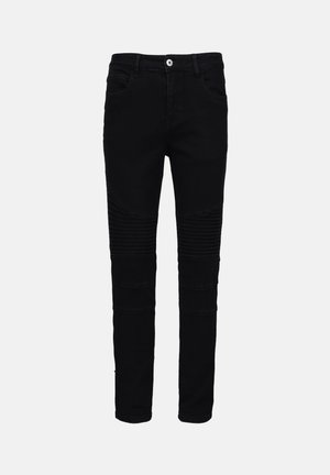 Mustad denim teksad kitsas lõikes, millel on ribakujundused alumistel sääremudelitel ja standardne viie tasku disain. Ees nupuga sulgumine.