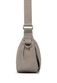 Beige fabric sling bag with a rounded shape, adjustable strap, zip closure, and a metal ring detail for added functionality.
