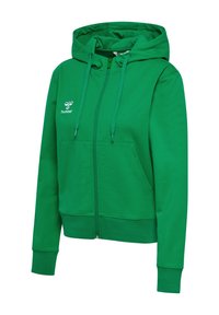 Zielona bluza z zamkiem wykonaną z miękkiego materiału, z kieszenią z przodu i kapturem ze sznurkiem. Zawiera logo "hummel" na klatce piersiowej.