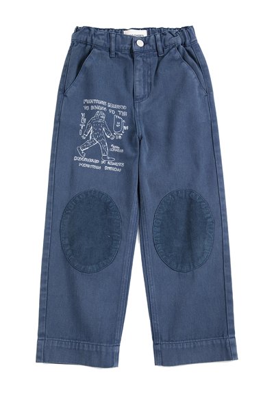 Pantalon enfant bleu marine avec taille élastique, poches avant, renforts de genoux foncés et motif Yeti blanc avec texte sur la cuisse gauche.