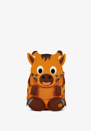 Orange children’s backpack designed as a smiling giraffe with large eyes, ears, horns, and brown spotted accents.