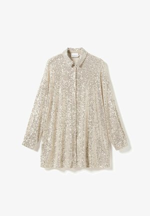 Beżowa koszula z cekinami, z długimi rękawami, wywiniętym kołnierzem i prostym krojem. Posiada błyszczącą powierzchnię z pionowym wzorem.