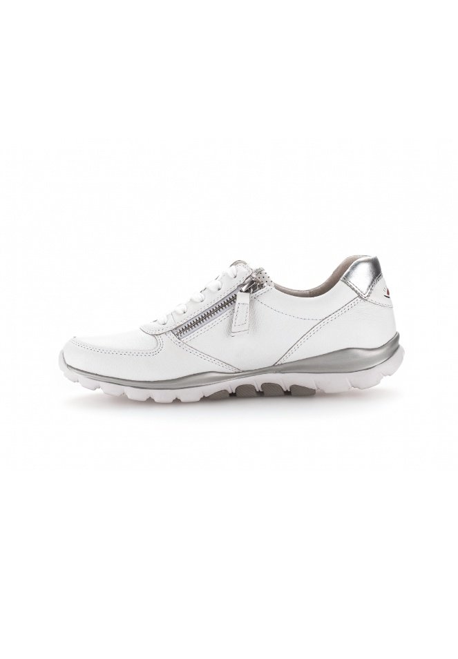 White leather sneaker with silver accents, a side zipper, textured sole, rounded toe, and cushioned interior for comfort.