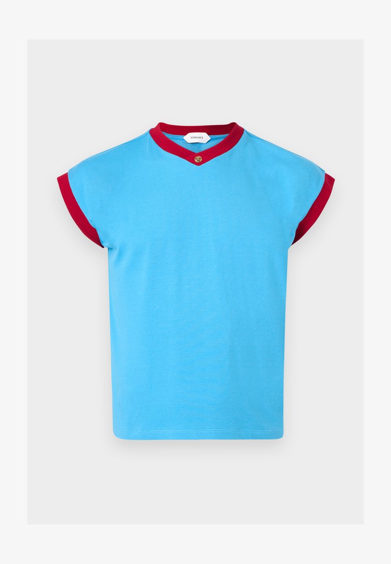 Short-sleeve blue top with red trim on sleeves and neckline, featuring a small gold button detail at the center collar.