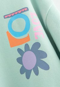Next REGULAR FIT - Collegepaita - green floral shapes