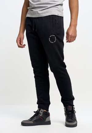 HOSE KERSYN - Tracksuit bottoms - schwarz